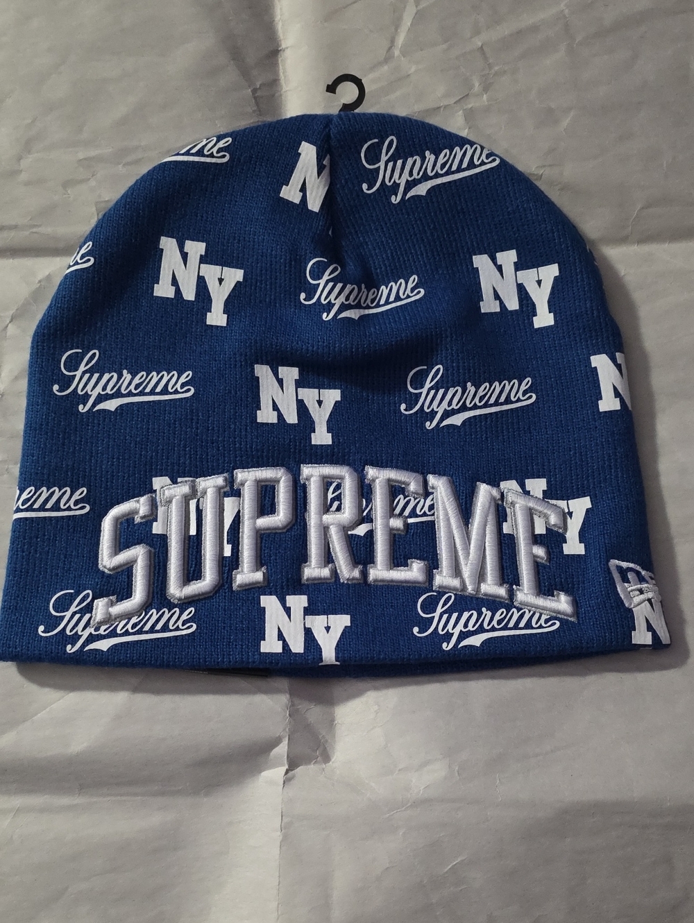 Brand New Supreme And New Era Royal Blue Beanie with White Logos.